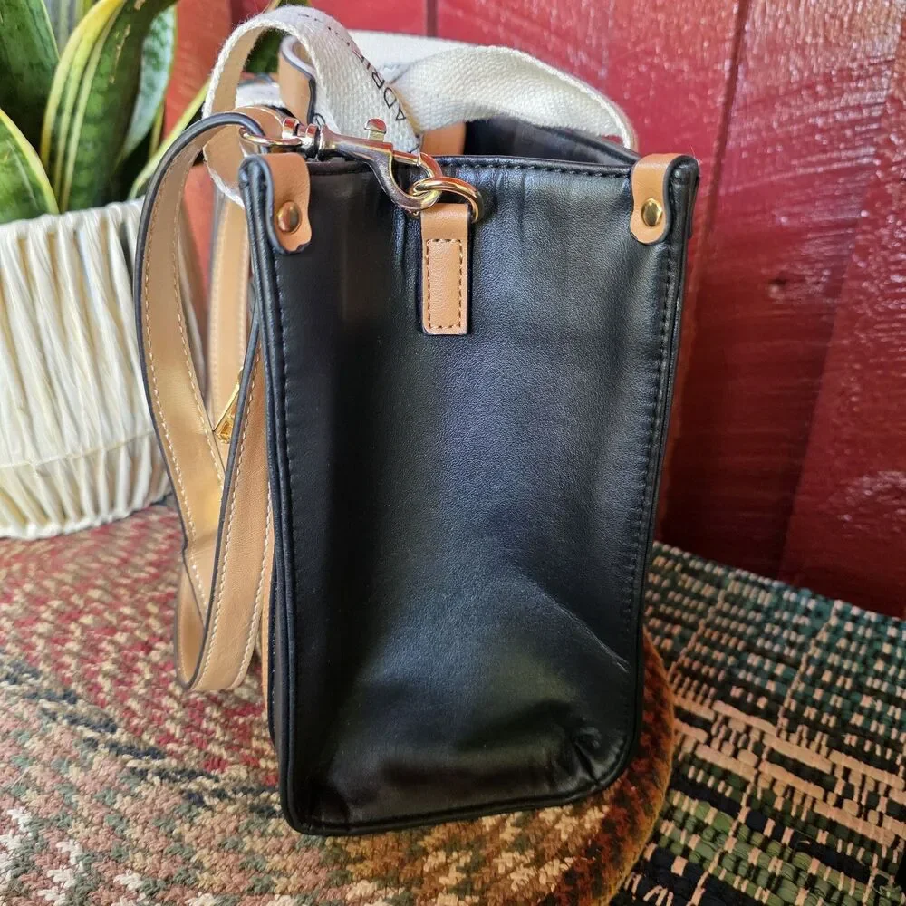 Adrienne Vittadini Black Tote Canvas Logo Straps w AV Charm Top Zip Closure EUC